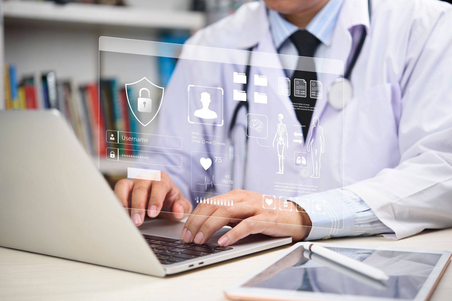 Doctor using laptop with medical data overlay; stethoscope, books, and tablet visible.