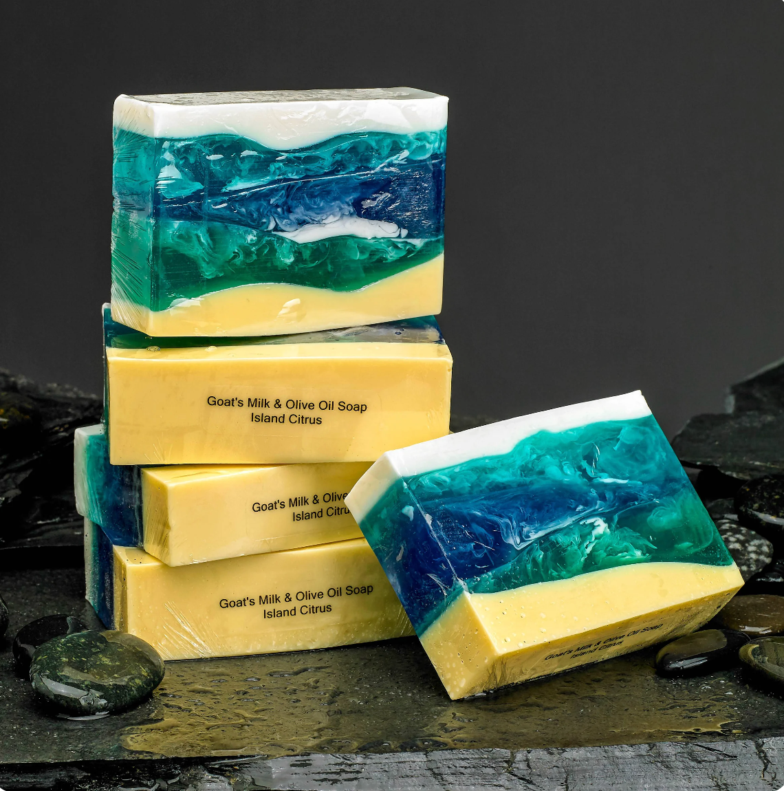A stack of soap bars with a blue and yellow design on them