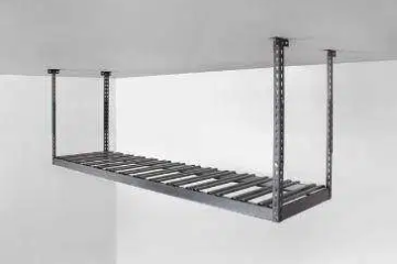 A 2x8 metal shelf is hanging from the ceiling in a garage.