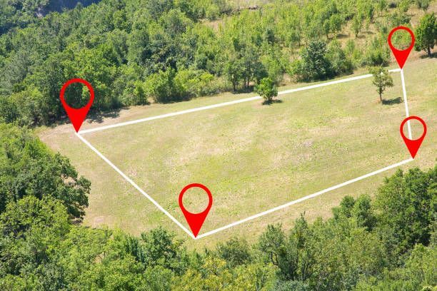 An aerial view of a field with markers on it.