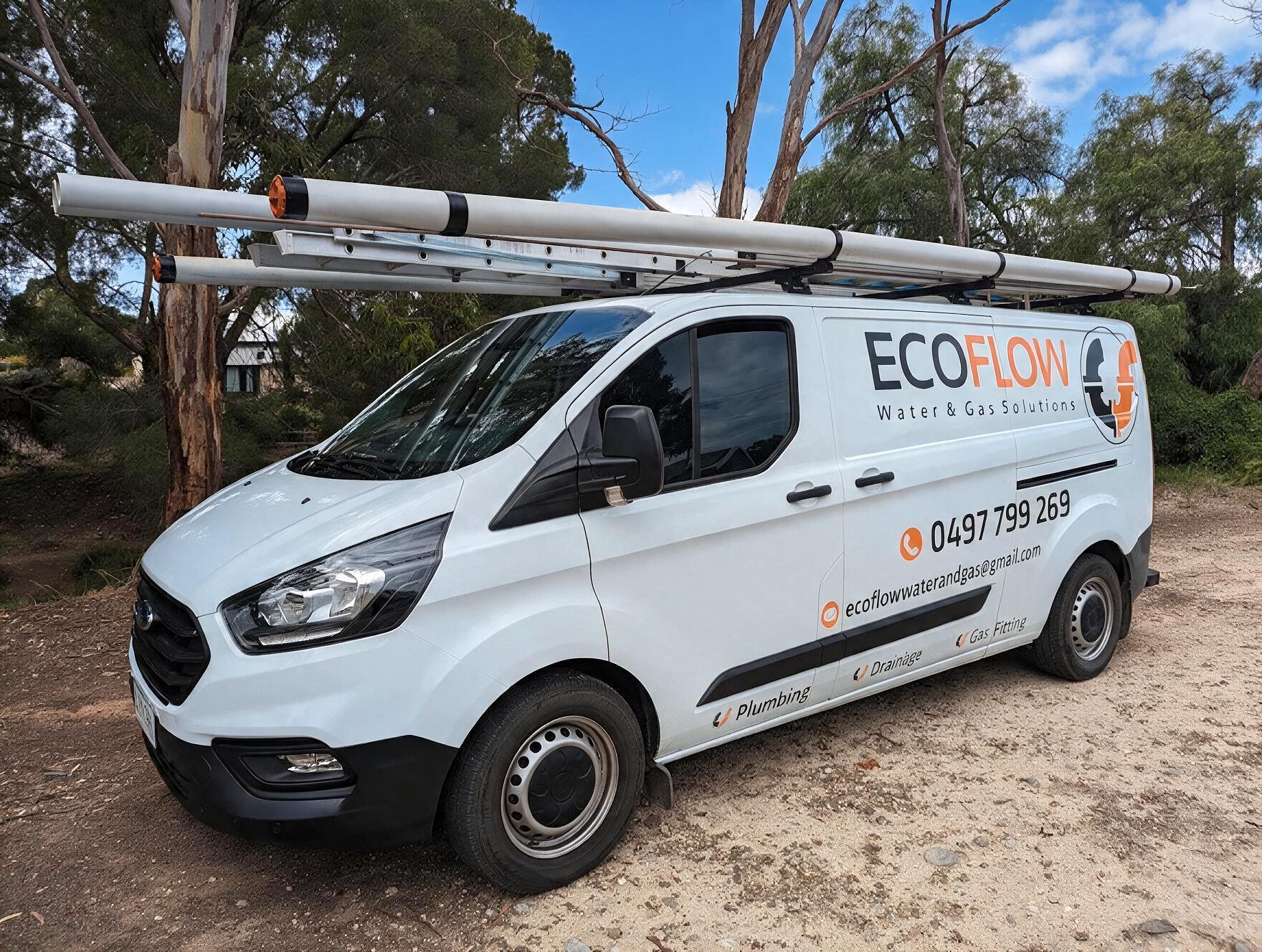 White utility van with ladder rack parked on a dirt road near trees, branded ECOFLOW on the side