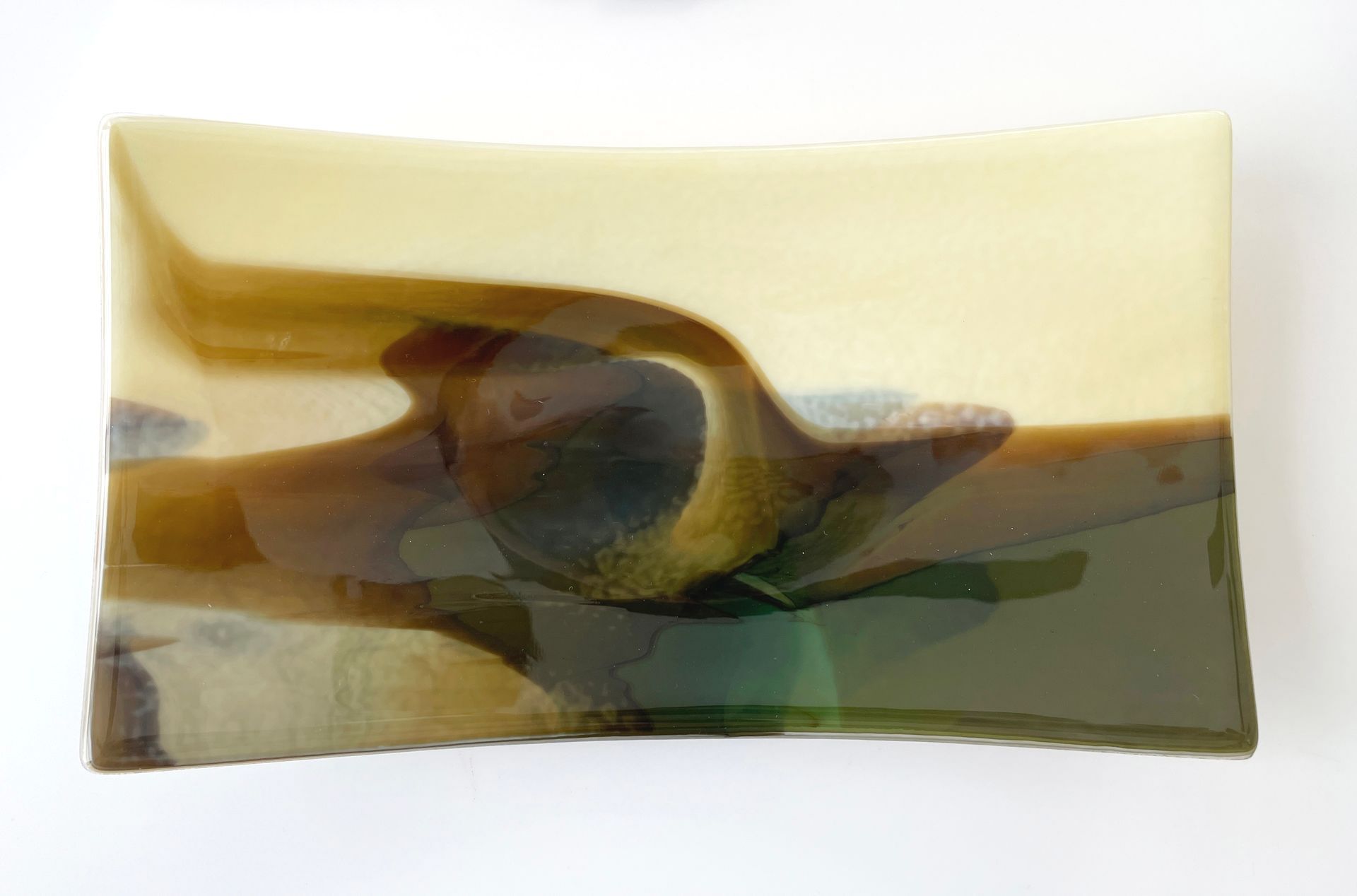 fused glass tray with vanila, browns, green abstract design