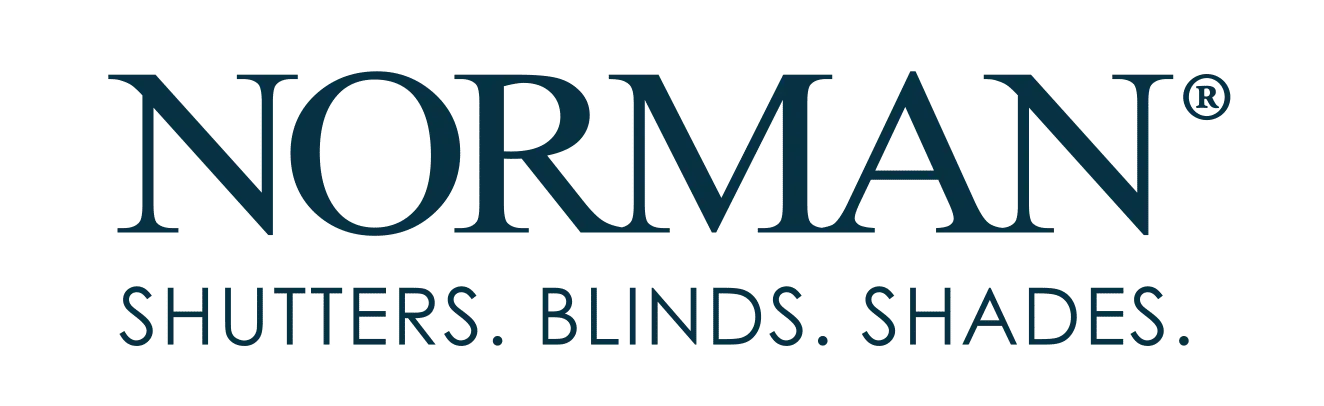 Logo for Norman, featuring the brand name in a bold, dark serif font with the text