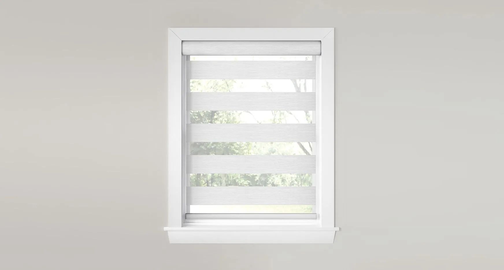 A white window frame featuring layered zebra blinds with alternating opaque and translucent stripes.