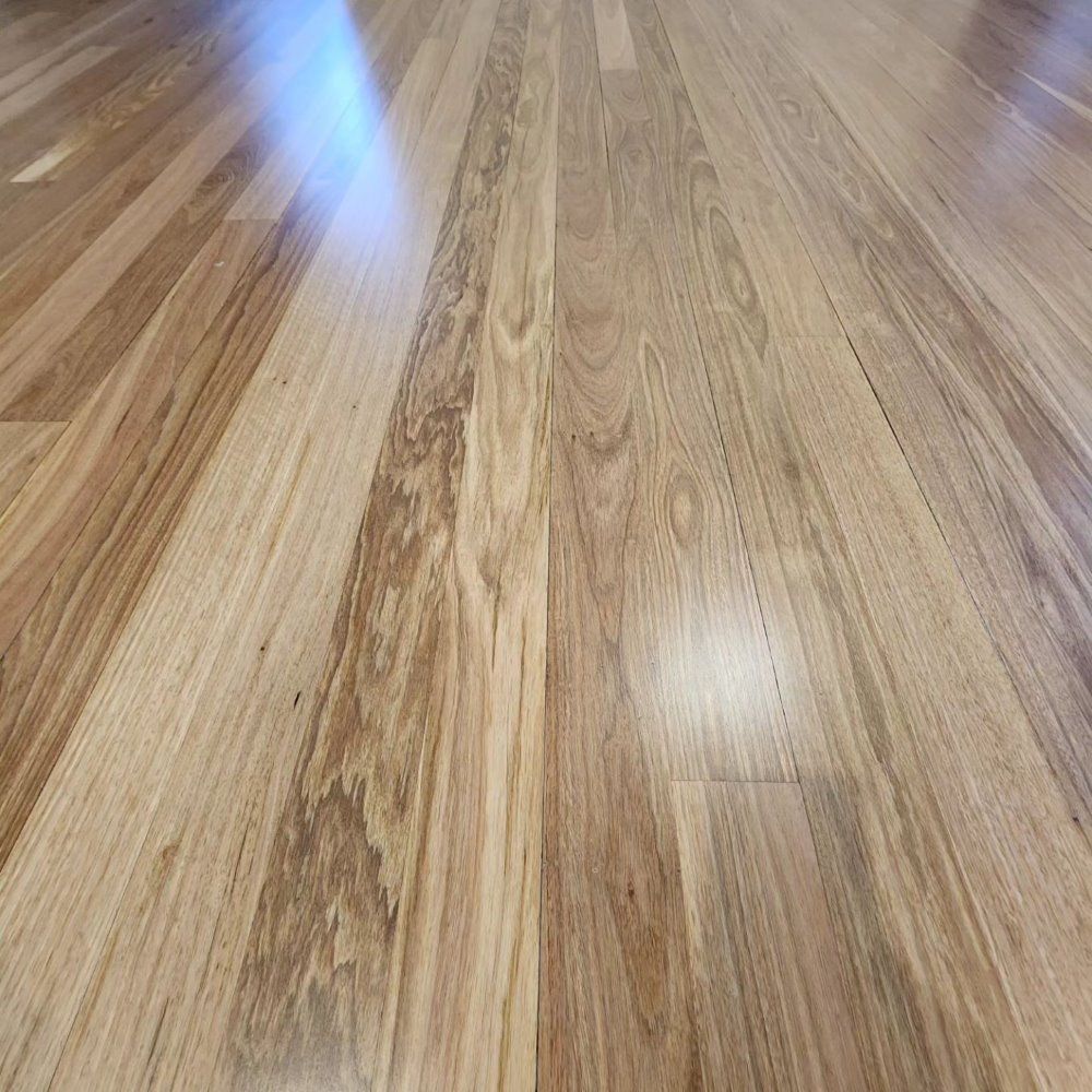 A Close Up of a Wooden Floor in a Room — ATM Floors In Ayr, QLD