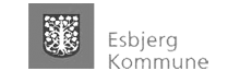 Et sort/hvidt logo for esbjerg kommune med et træ på