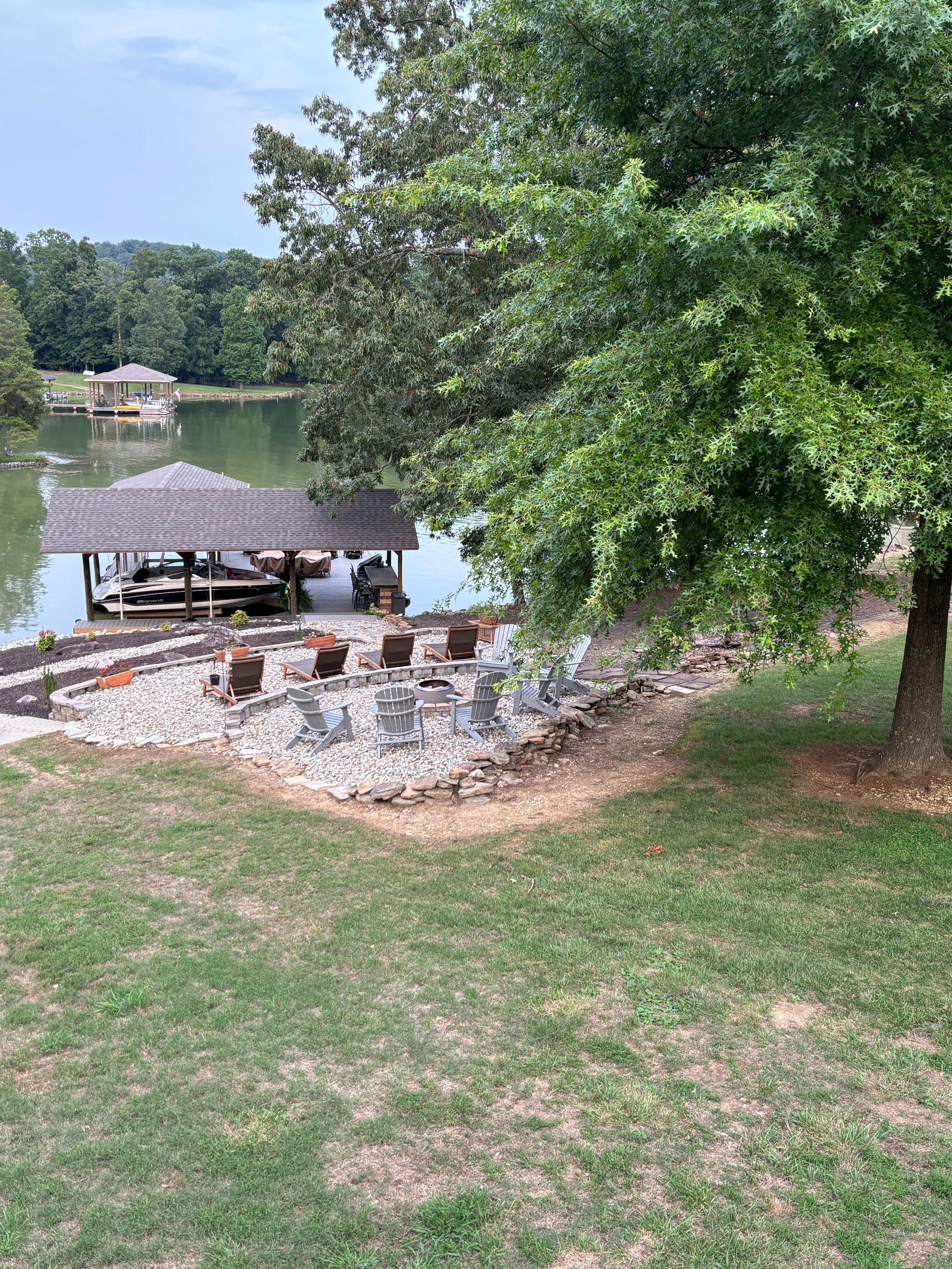 There is a dock in the middle of a lake.