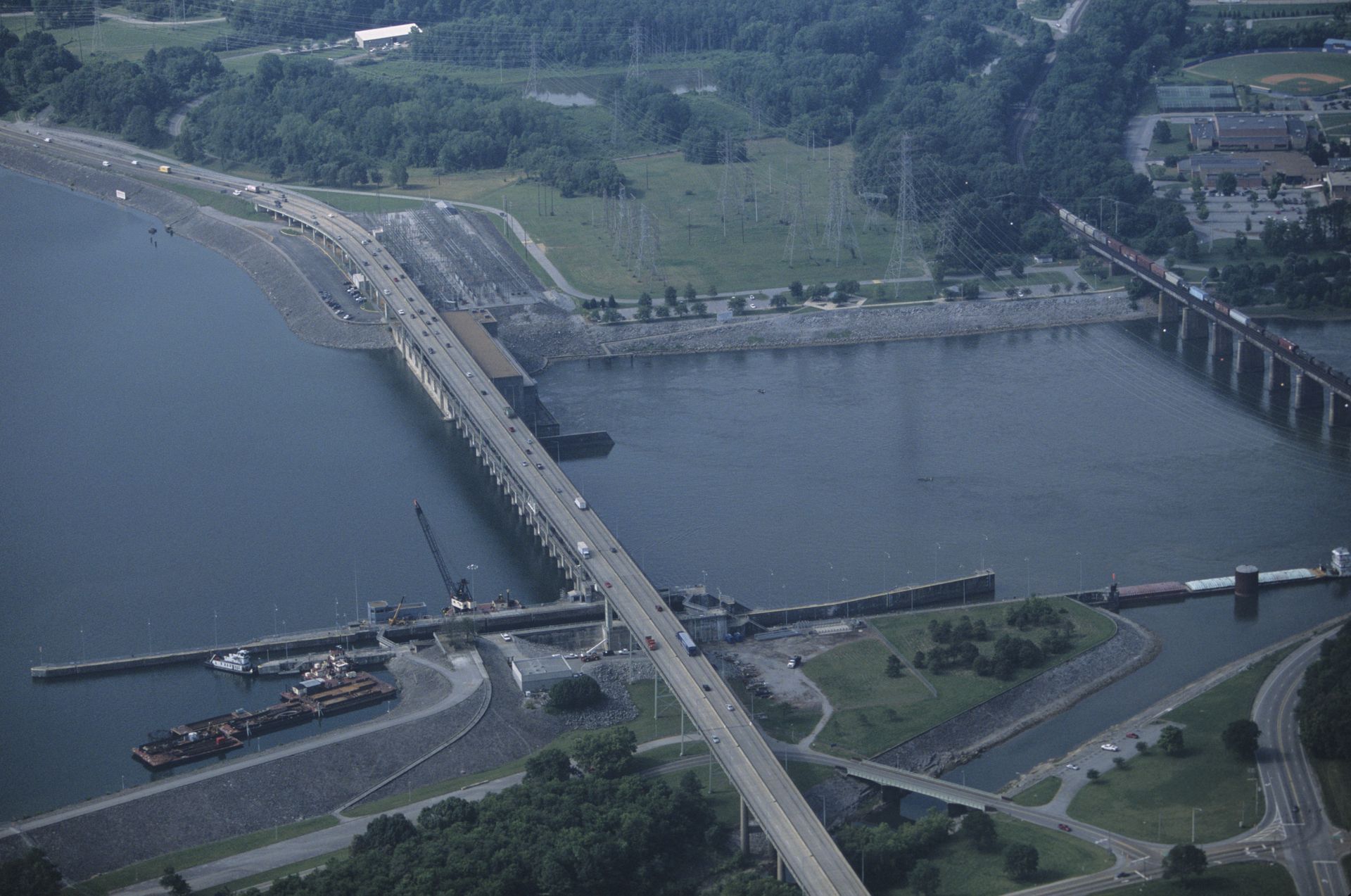 An aerial view of a bridge over a body of water
