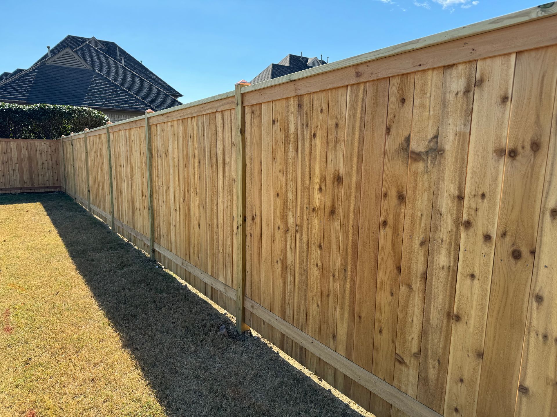 ^ foot cedar fence with fascia