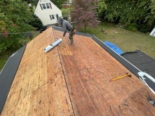 Worker Installing Roof — Chicopee, MA — Nova Home Improvements