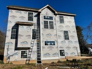 Big House and Ladder — Chicopee, MA — Nova Home Improvements
