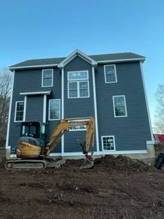 Excavation Truck and Big House — Chicopee, MA — Nova Home Improvements