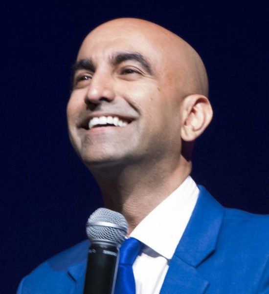 Man in blue suit closeup