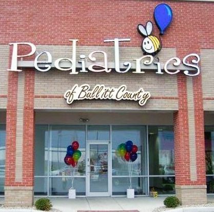 A brick building with a sign that says Pediatrics of Bullitt County.