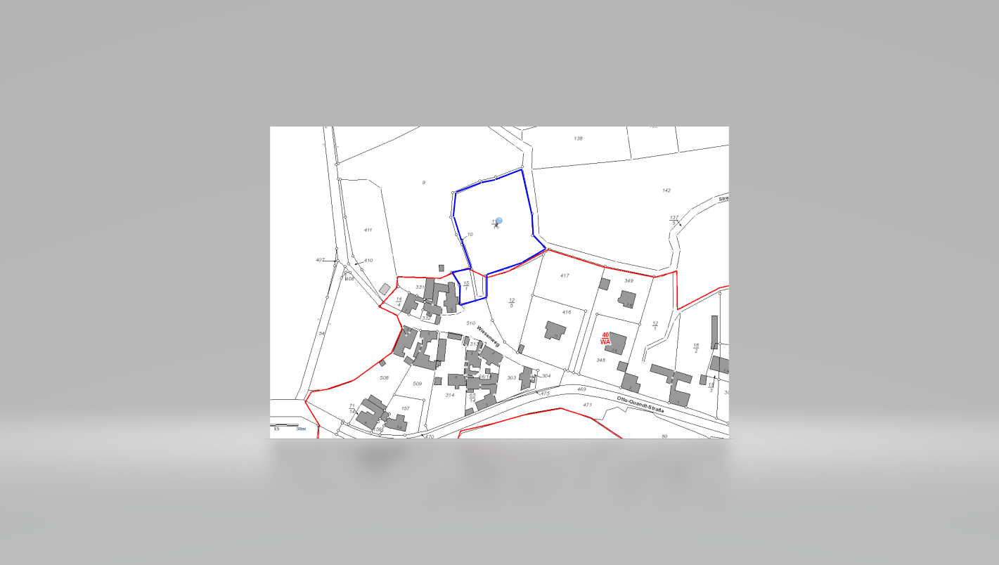 Kleine Karte mit einem Lageplan, Grenzlinien und farbigen Grundstücksumrissen, einschließlich blauer und roter Abschnitte.
