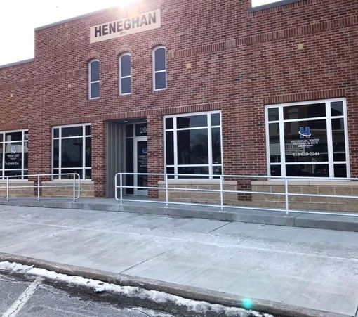 A brick building with the word heneghan on it