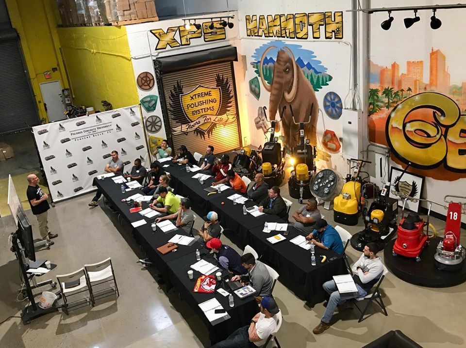 LEGO-style banquet scene with tables of minifigures in a colorful mural-covered room