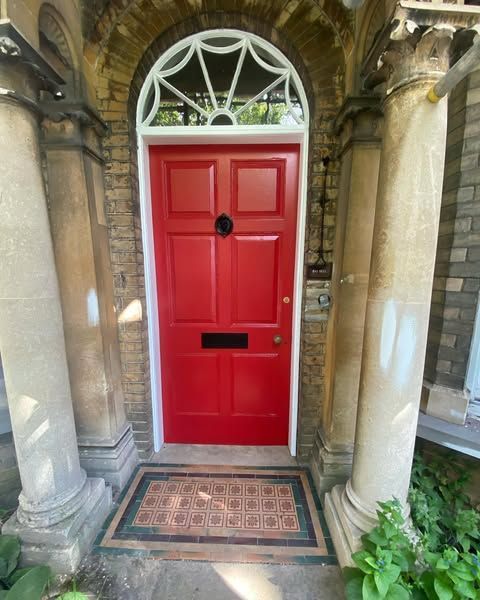 A  beautifully painted red front door by professional painter and decorator. | Painting your front door.