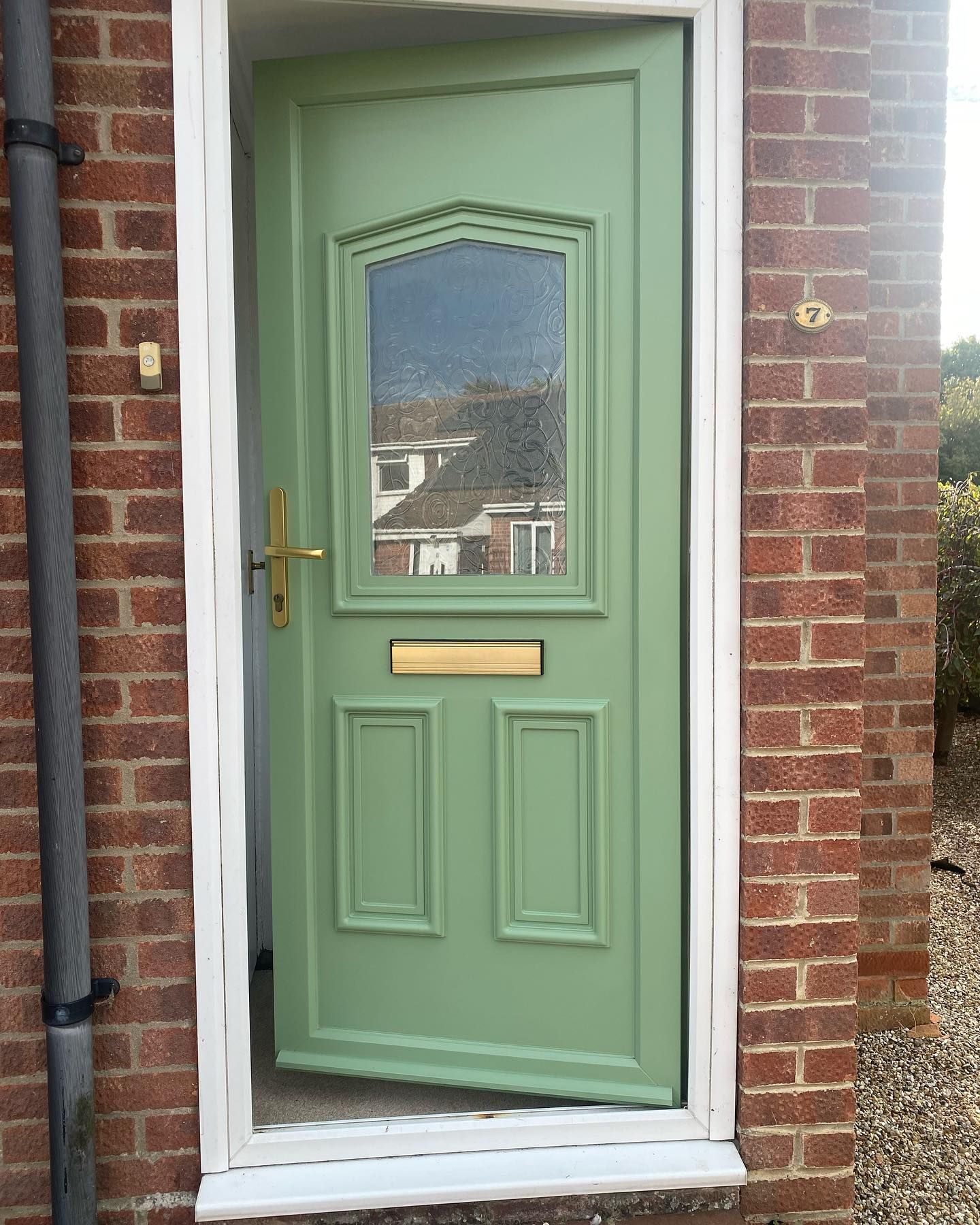 A  beautifully painted red front door  by professional painter and decorator. | Painting your front door. | DMB Painting and Decorating.