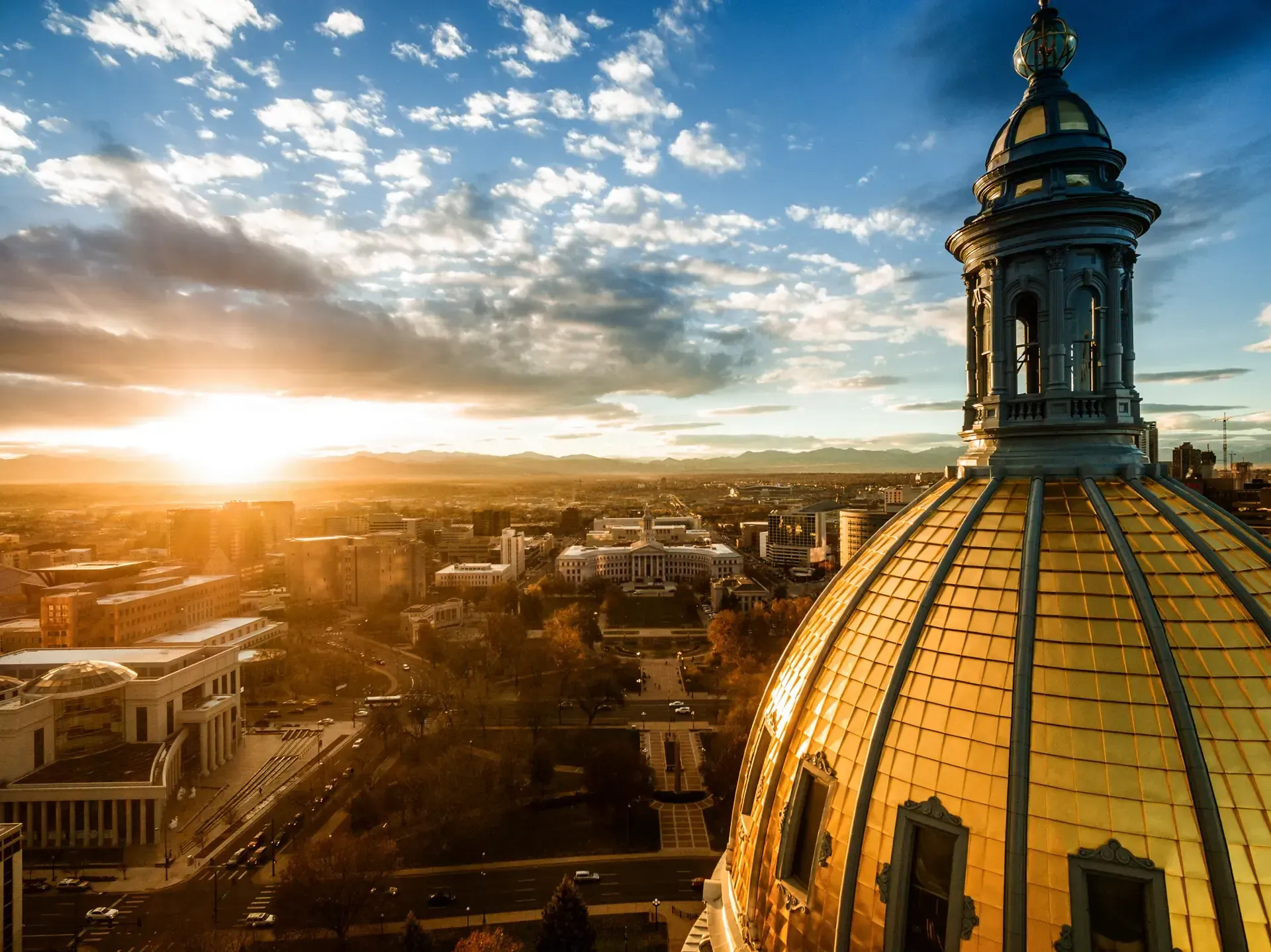 View from the top of the Colorado State Capitol in Denver with the Front Range spanning the city