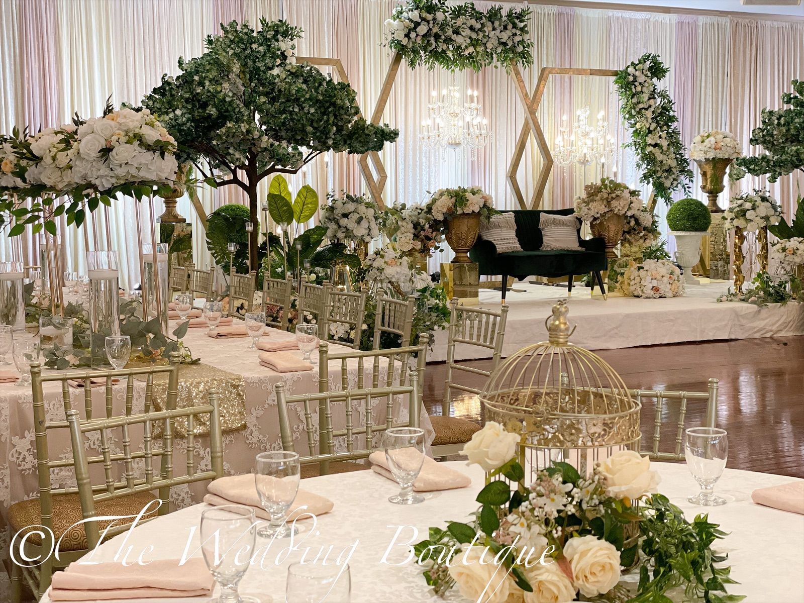 Decoration of stage and tables at Indian wedding by Madiha at The Wedding Boutique