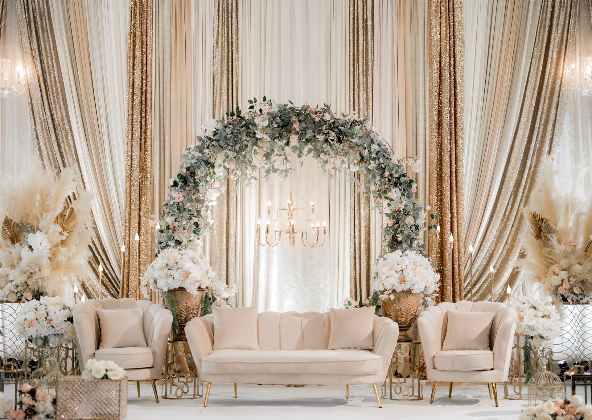 Valima inspired colors in flowers and drapes for an Indian wedding reception stage
