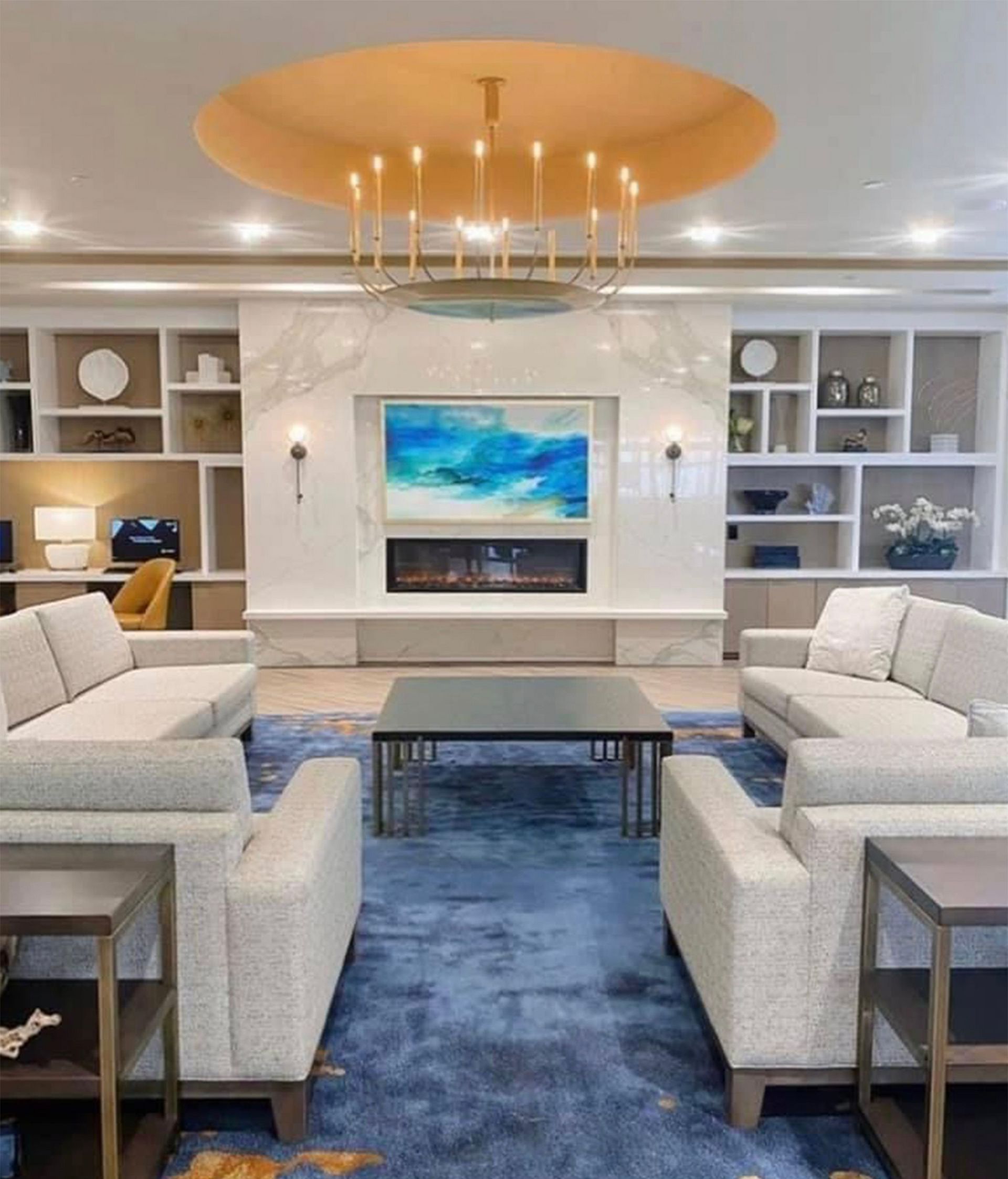 A living room filled with furniture and a fireplace.
