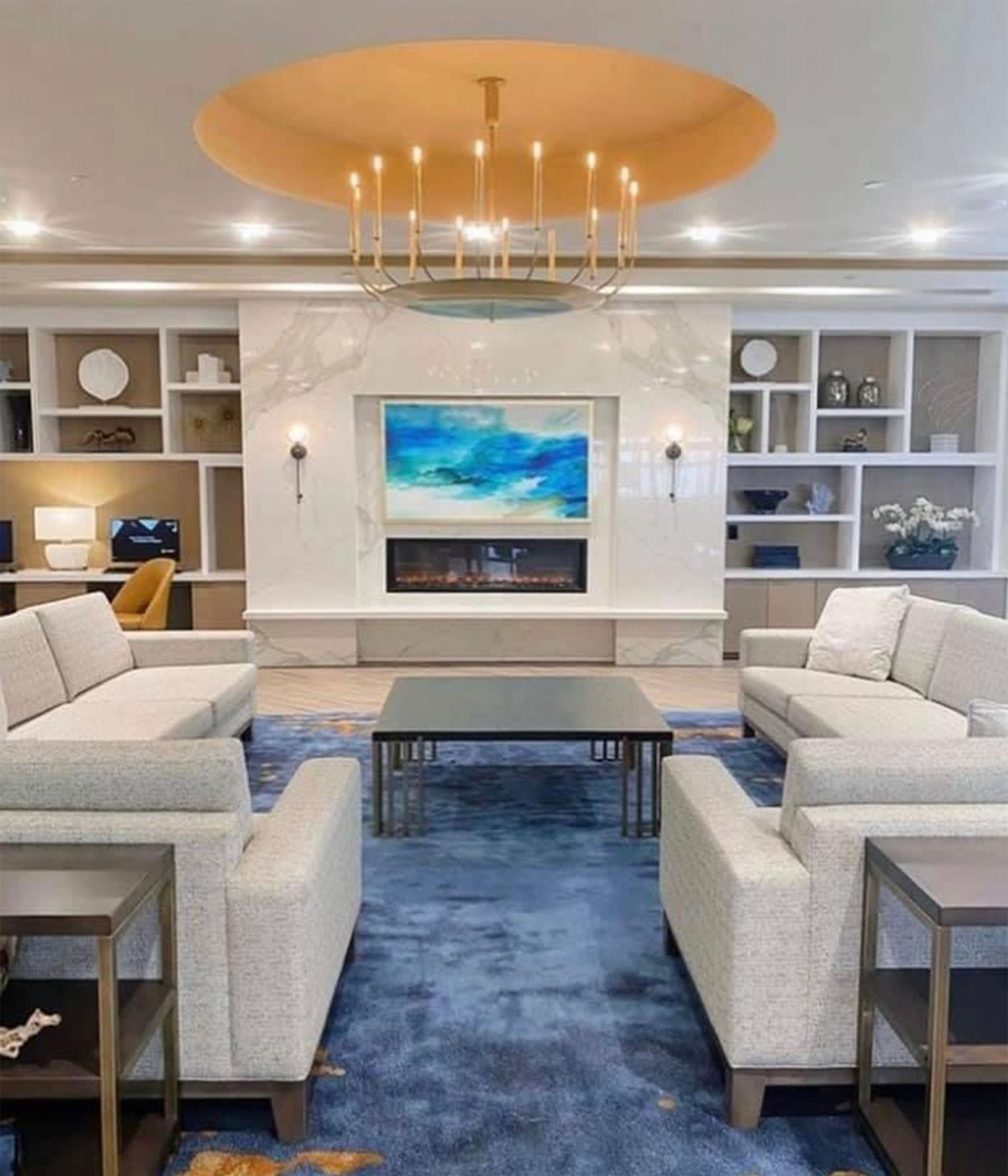 A living room filled with furniture and a fireplace.