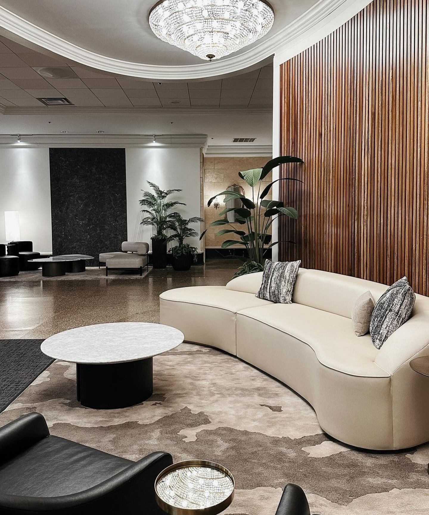 A living room with a couch and a coffee table