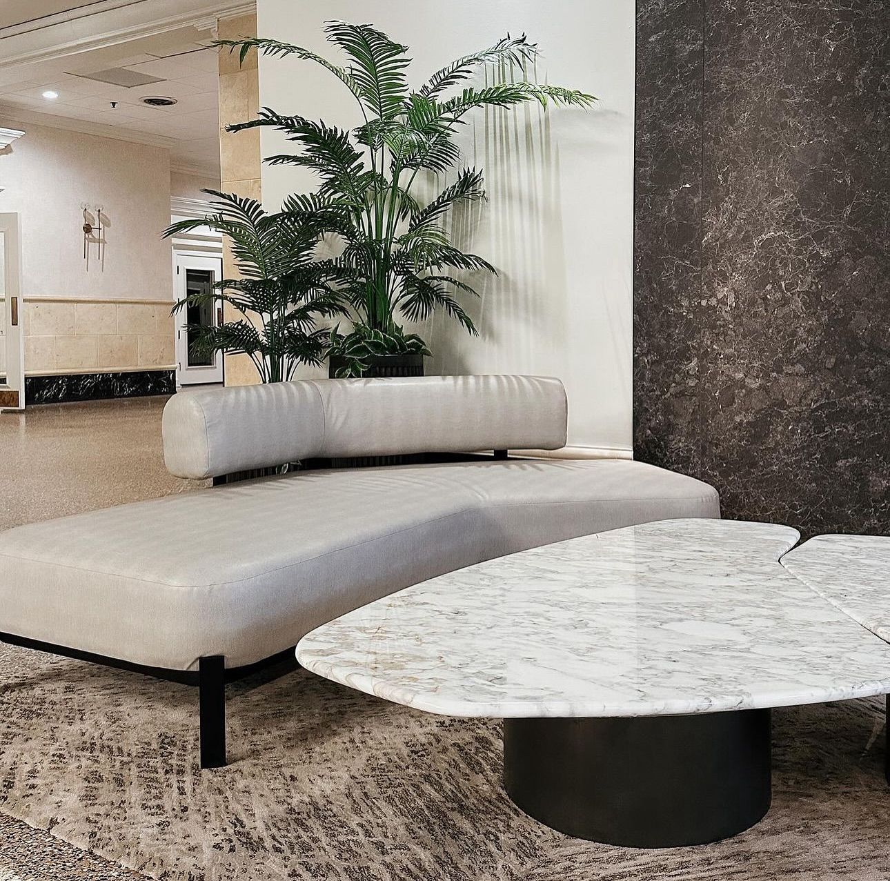 A living room with a couch and a coffee table