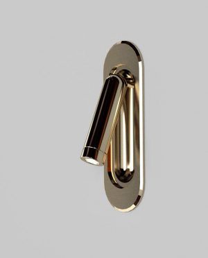 A gold wall light with a black shade on a white background.