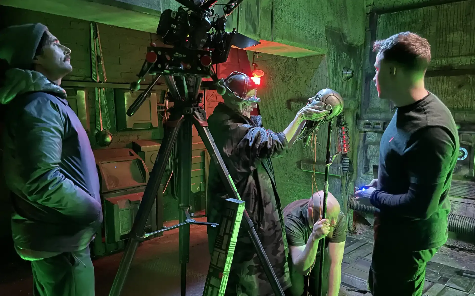 Split-screen comparing animatronics, showing a mechanical dinosaur model, and CGI, featuring a digital creature on a screen.
