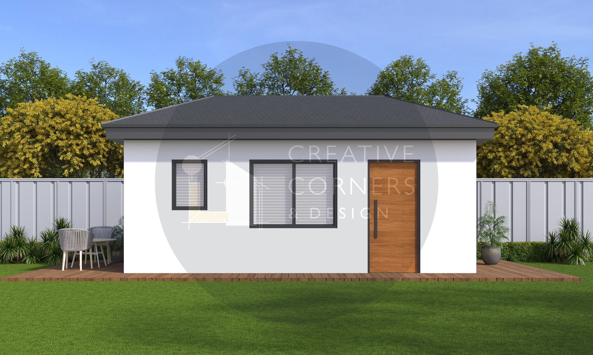 Small modern white house with dark roof, front door, windows, and a grassy yard with patio furniture.