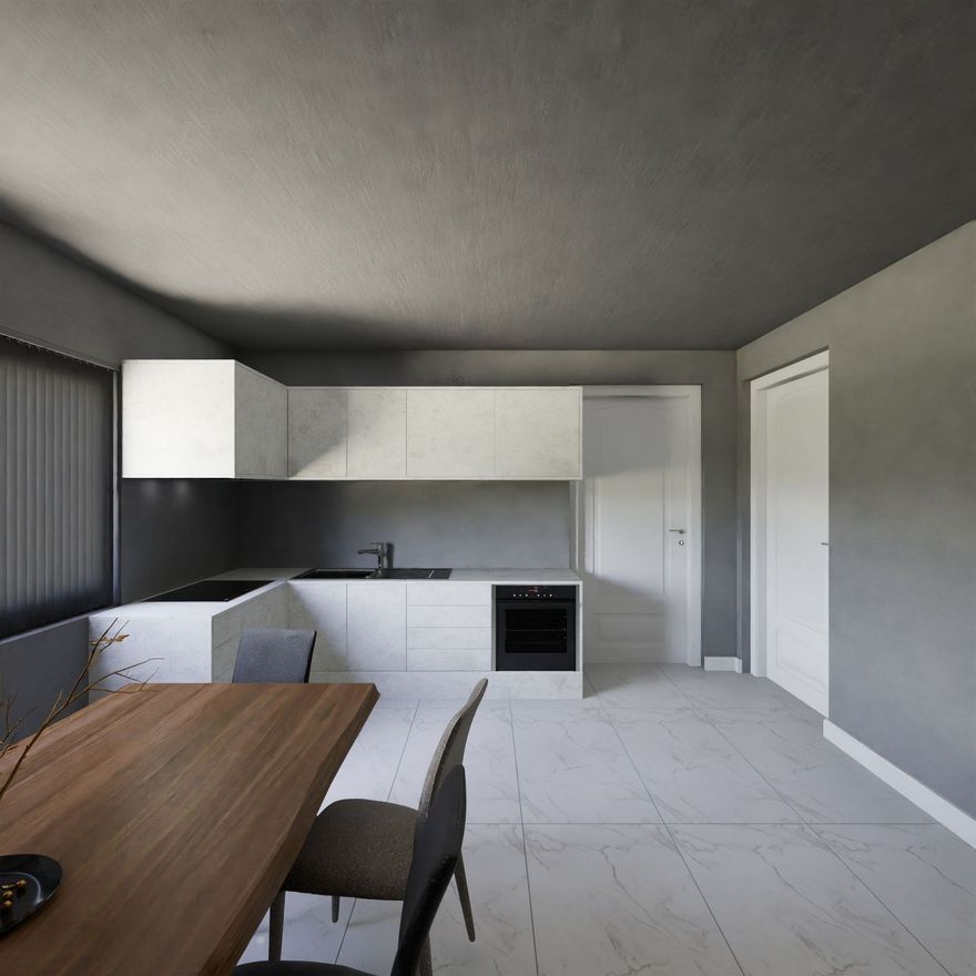 Modern gray kitchen and dining area with white cabinets, wood table, and tiled floor