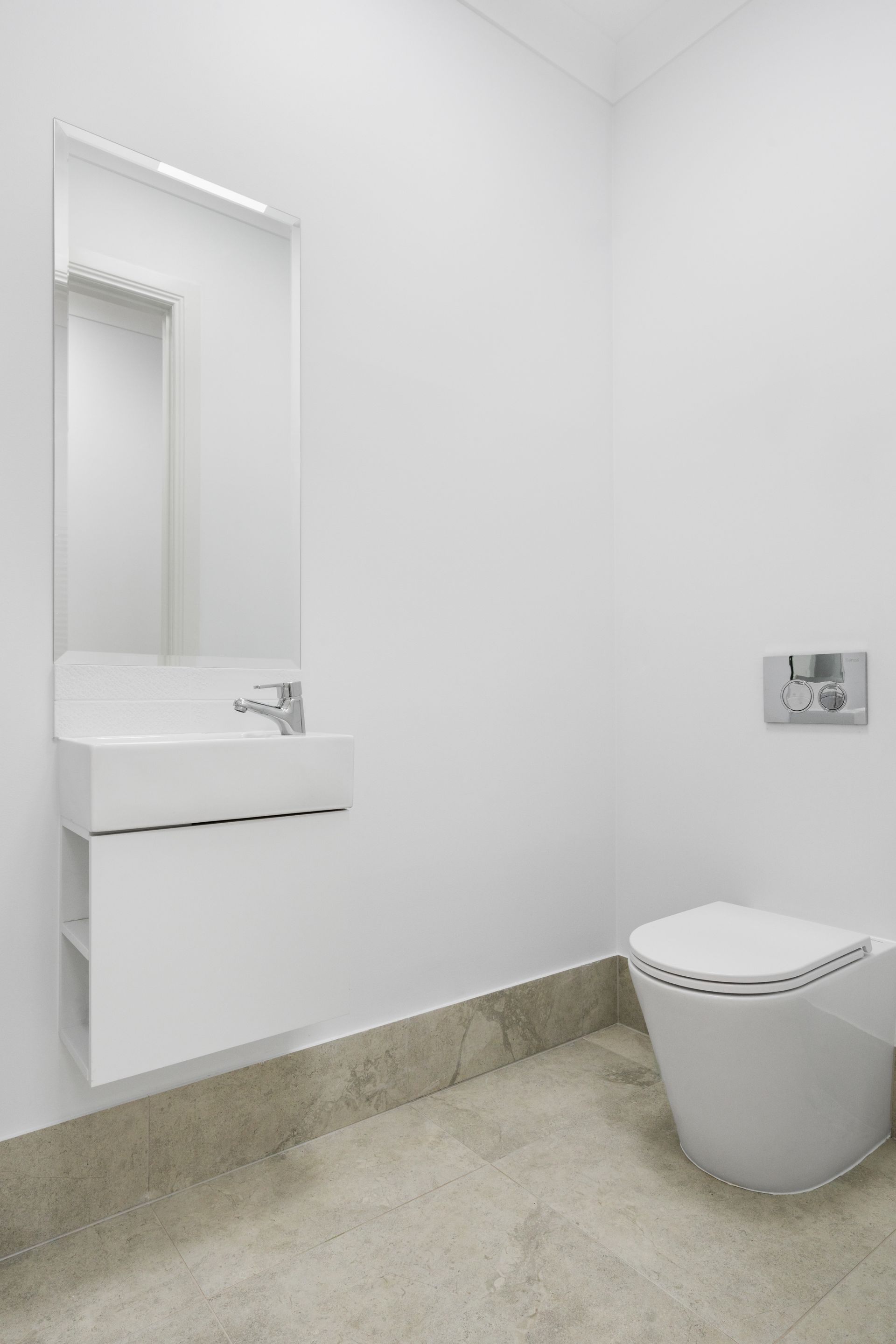 Minimal White Bathroom with Wall-Mounted Sink, Mirror — Rivbuild In Uranquinty, NSW