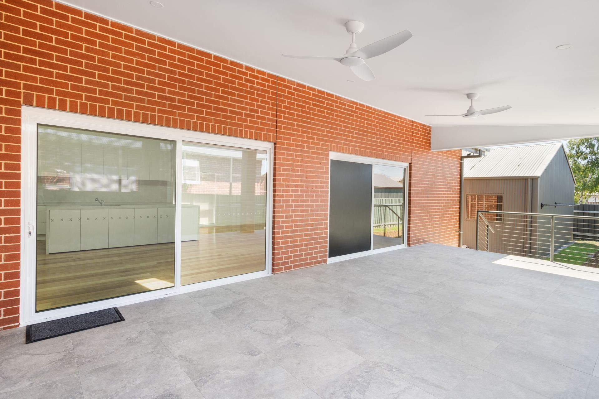 Covered Patio with Brick Wall, Large Sliding Glass Door — Rivbuild In Uranquinty, NSW