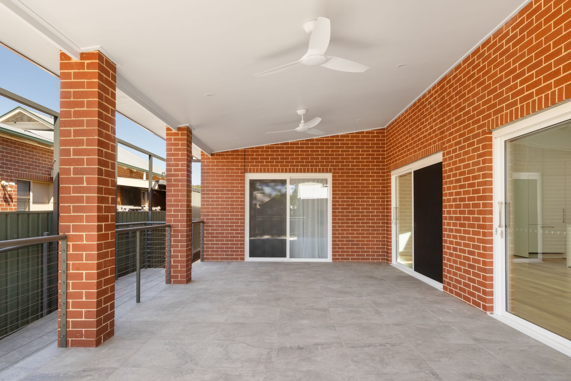 Covered Brick Patio with Concrete Floor, Ceiling Fans — Rivbuild In Uranquinty, NSW