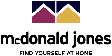 A logo for mcdonald jones that says find yourself at home