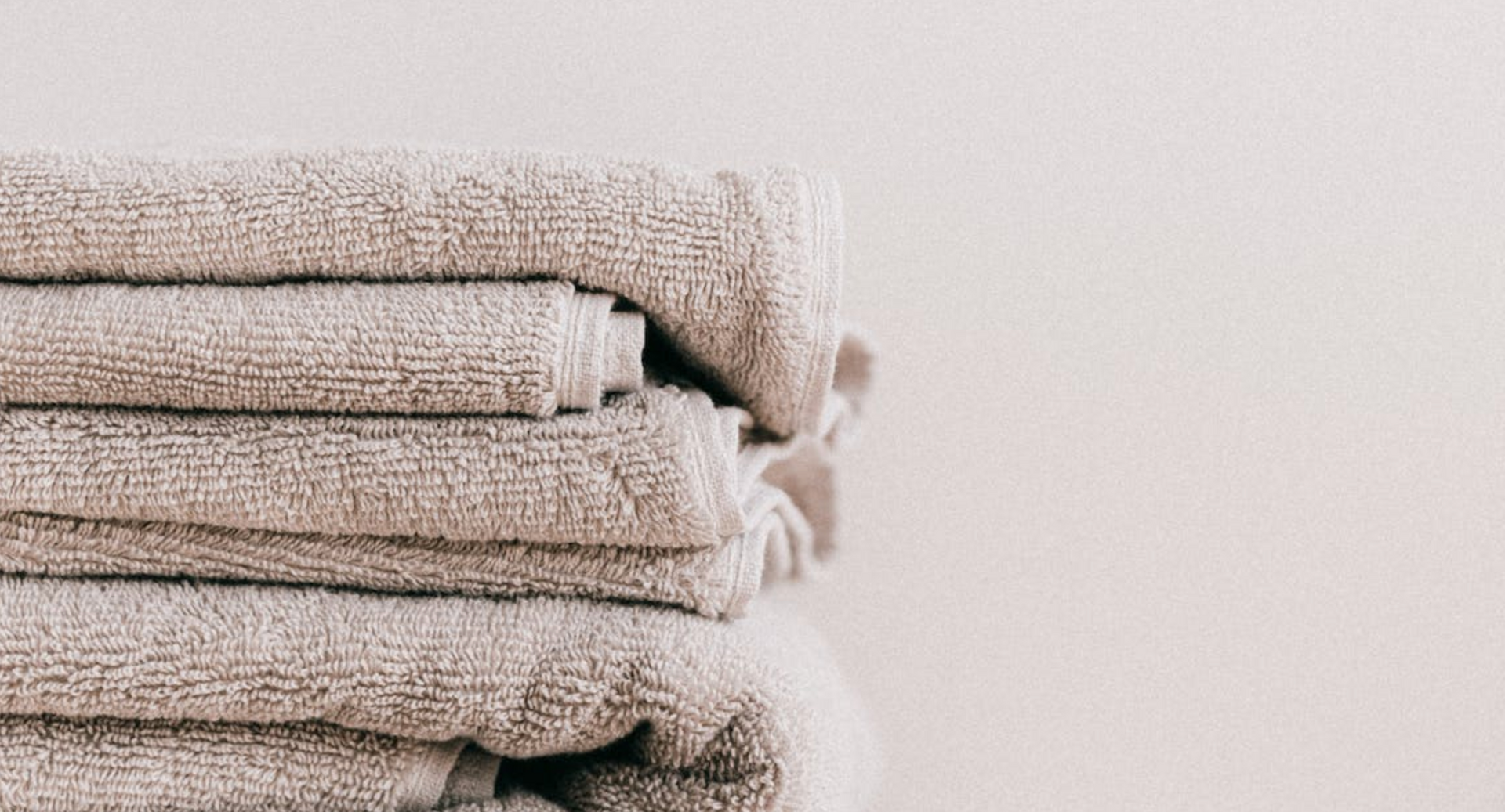Towels that have been recent washed, dried and folded 