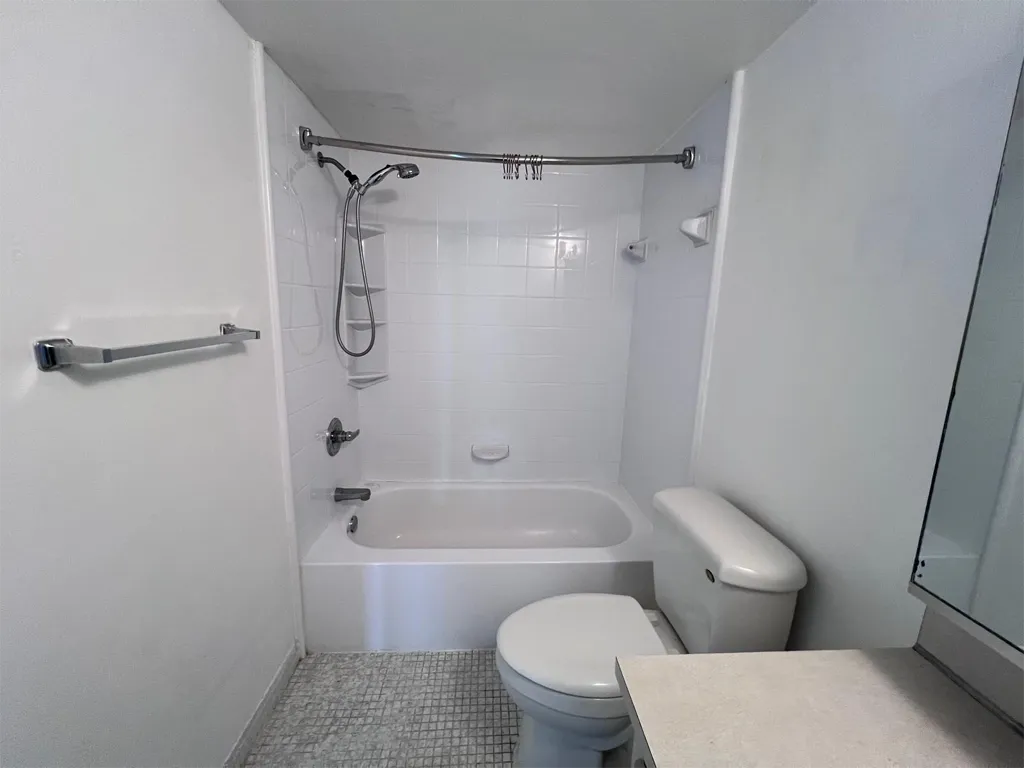 Full bathroom, shower, view in Unit 703, Ixora Ct, North Miami, FL 33181.