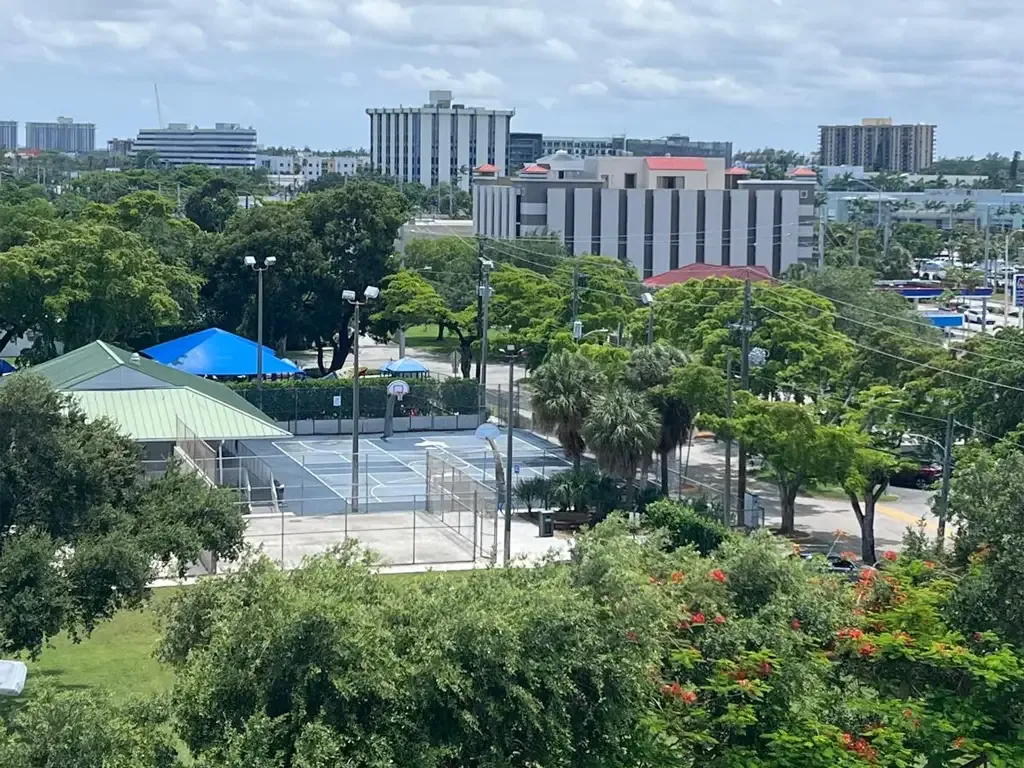 South exterior view from balcony of Unit 703, Ixora Ct, North Miami, FL 33181.