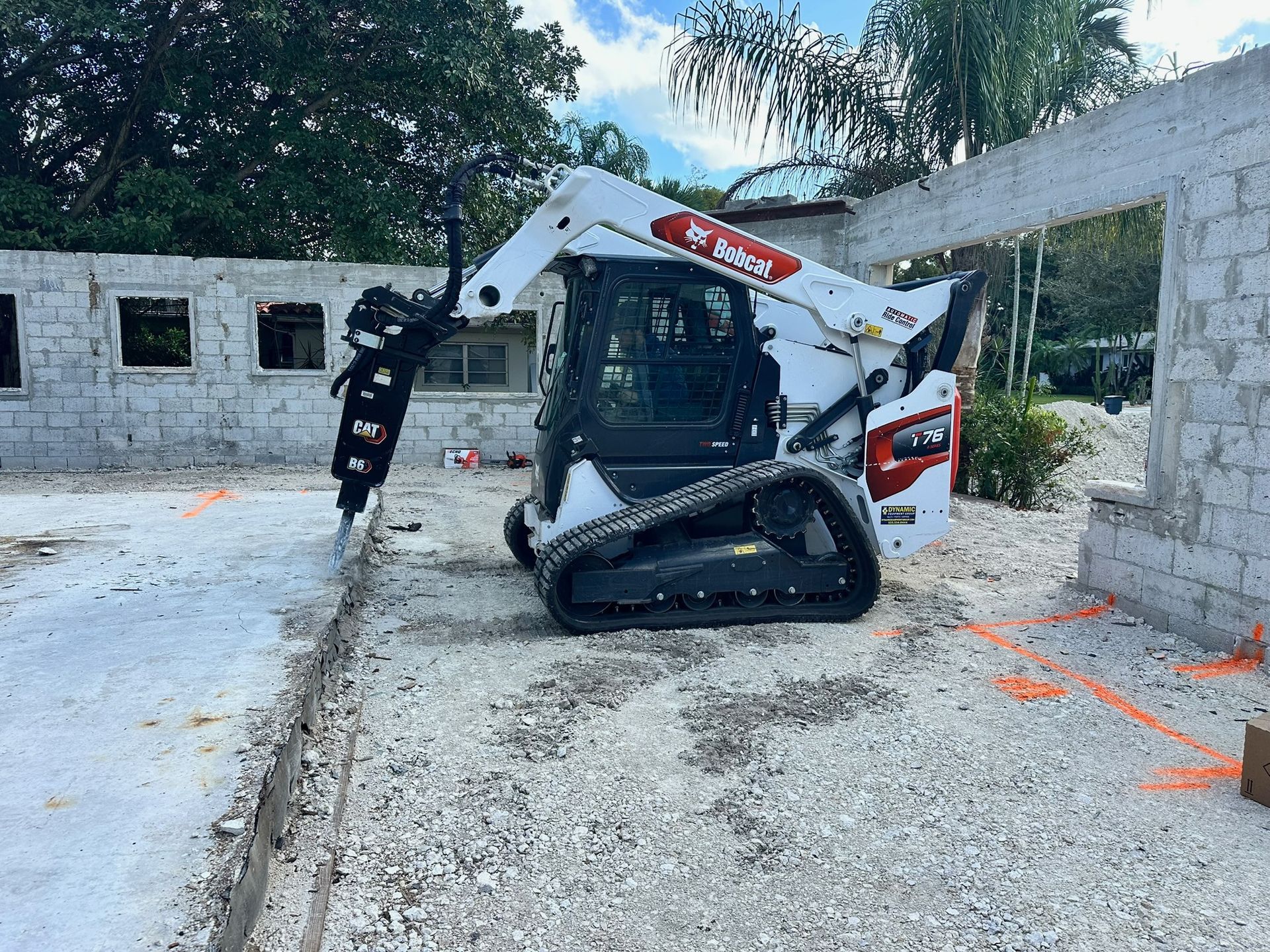 A concrete foundation is being built in a residential area.
