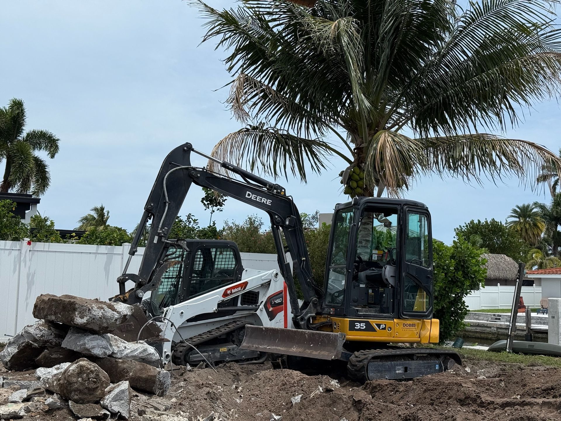 A group of construction workers are working on a construction site.