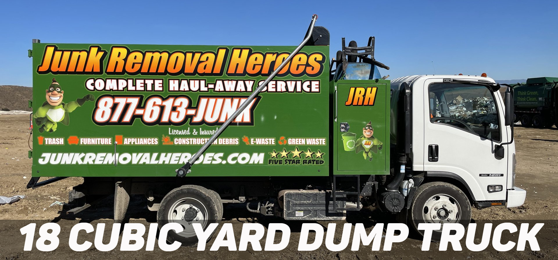 Green Junk Removal Heroes dump truck with logo, number and website. Reads “18 Cubic Yard Dump Truck.”