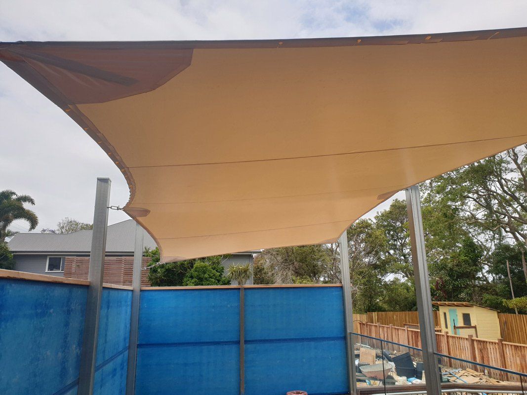 Residential Yellow Shades Sail — Smart Shades Lismore NSW