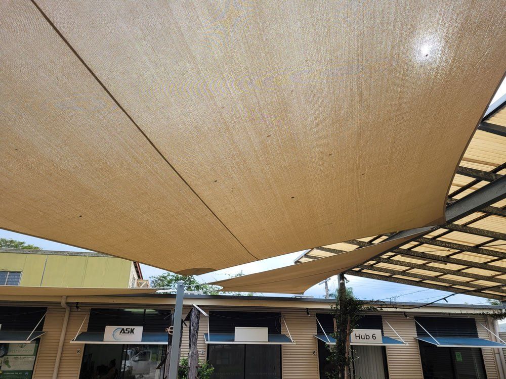Two Yellow Colour Shade Sails On The Business Area — Smart Shades Lismore NSW