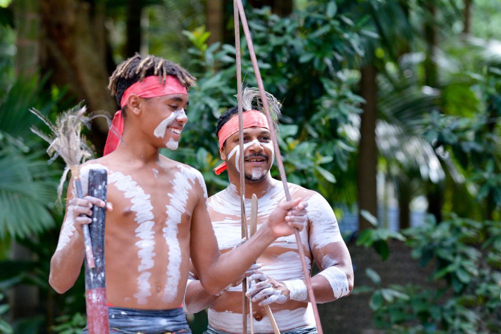 Two Indigenous Australians Performing Cultural Ceremony - Queensland Lawyers In Cairns
