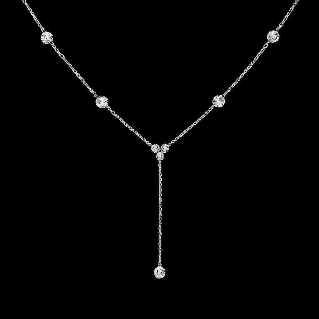 Silver necklace with scattered round, sparkling gemstones and a vertical drop.