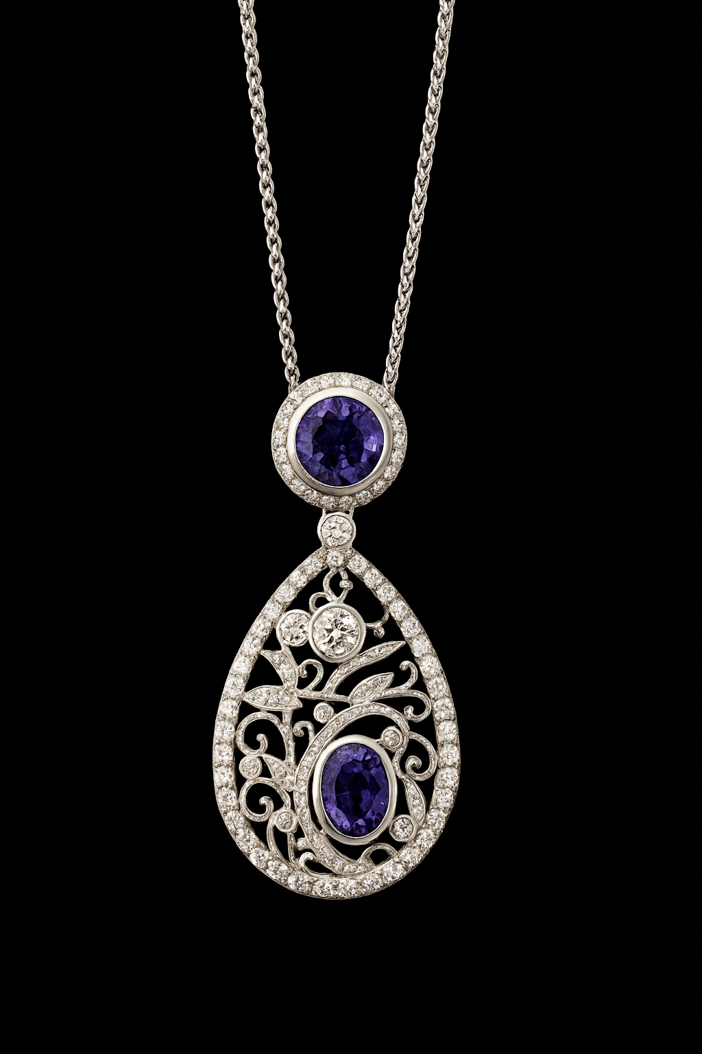 Diamond and tanzanite pendant necklace with floral filigree on black background.