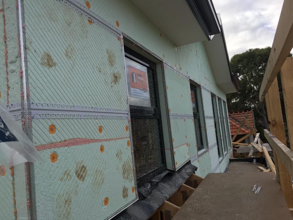A House With A Lot Of Windows Is Being Built – Dandenong, VIC - Pearl Rendering Services